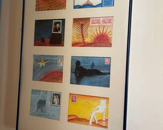 Jean-Michel Folon Postcards - as sent through the mail in the style of Wallace Berman. A postcard illustrated in ink and watercolor by Jean-Michel Folonwas sent from France via air mail in 1976 to Evelyn Farland of Poster Originals, Limited. Her New York City gallery sold original art posters. On the postcard, Folon incorporated the company logo into his figure's eyes while mistakenly rendering the word Posters as a plural in the address. The artwork, complete with stamps and postmarks, was put on the auction block in 2019 with an estimate of $5,300 to 6,100.