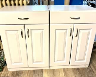 2 white storage cabinets with drawers