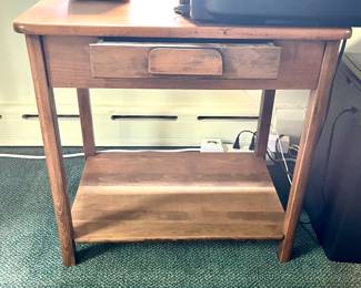 Wooden table with drawer