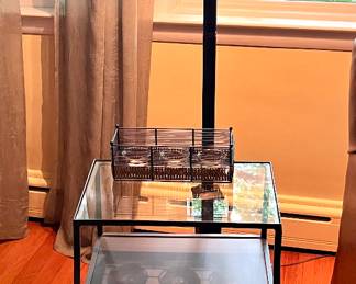 Stained glass floor lamp and metal and glass table with shelves