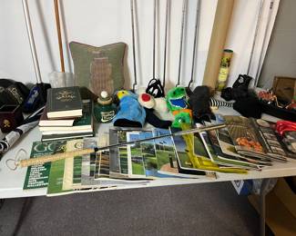 Golf club holders, golf clubs, golf magazines, golf books, etc. 
