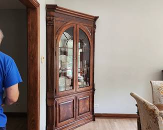 This corner cabinet, but please note none of the contents are for sale