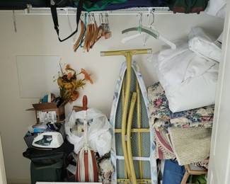 iron board, luggang, vacuum, closet will be unpacked for easy shopping