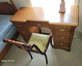 maple desk and mahogany side chair