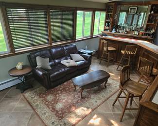Leather sofa and bar stools
