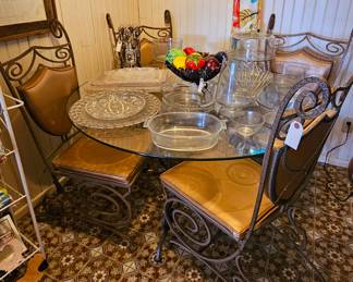 Glass topped 4 chair dining table 