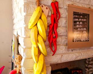 Glass hanging bananas and peppers and veggies