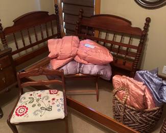 Spool style vintage twin bed frames, vanity stool, twin bedding