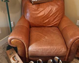 Leather arm chair with matching ottoman
Vintage brief case, cowboy boots