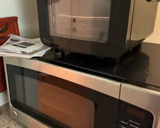 Kitchen appliances including microwave, air fryer