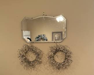 Hanging beveled mirror
Decorative wreaths