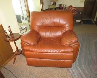 Lot 15. Leather rocker plus $40 for you