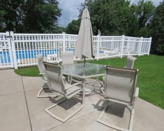 Lot 2. Patio table, umbrella and six chairs