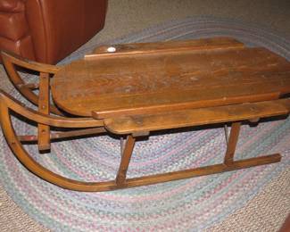 Lot 10. Antique wooden coffee table repurposed from a sleigh.&nbsp;51" W x 18" H