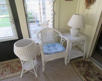 Lot 23. Wicker furniture: lamp, table, chair, and flower basket