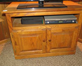 Lot 11. Oak TV stand