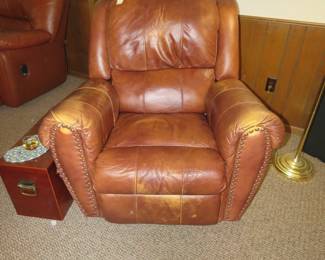 Lot 14. Swivel rocker chair plus $40 for you