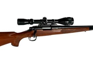 Remington Model 700 .243 Winchester Rifle w/ Prohunter 6-18x40 AO Scope