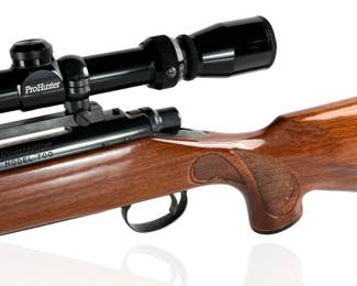 Remington Model 700 .243 Winchester Rifle w/ Prohunter 6-18x40 AO Scope