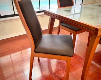 Scandinavian-style glass table & 4 chairs - expands to fit 10 chairs