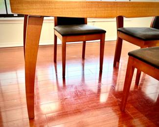 Scandinavian-style glass table & 4 chairs - expands to fit 10 chairs