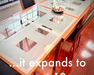 Scandinavian-style glass table & 4 chairs - expands to fit 10 chairs