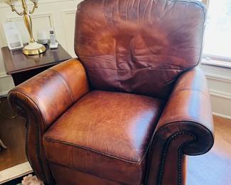 Nail head trim leather recliner