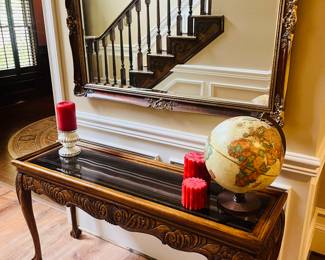 Glass top ball and claw foot sofa table