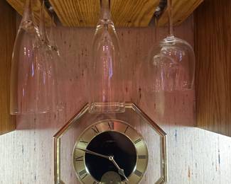 Vintage wall clock, bar glasses