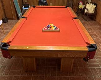Custom built pool table with regulation table tennis topper