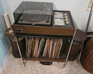 This very vintage stereo record player works fine.  I have all the original paper work too
Speakers come off and so does the whole unit. Comes off so you can put on a dresser. 
$300 price firm If it sells great if it doesn't know biggie