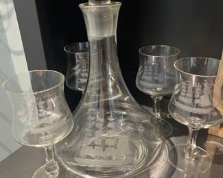 Wine set with etched ship design 