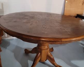 Circular dining table