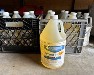 Parabond Flooring Installation Products.  DETACH II Flooring Adhesive Remover. (10) clear bottles are full, an 11th is mostly full. (2) white bottles feel full, cannot verify.