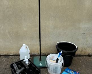 Cleaning supplies - gloves, buckets, caddy, and spray bottles. Manual Bissel Sweeper