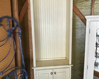 Tall white cabinet.