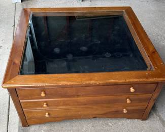 Display case coffee table with drawers