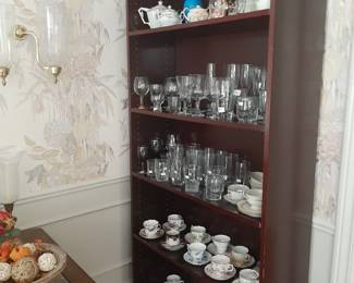 7' tall bookshelves, assorted glassware and teacup/saucer sets