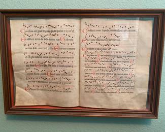 Not paper, maybe vellum or sheep skin, with Gregorian chat music.