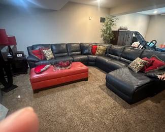 Living room sectional and my finger 
