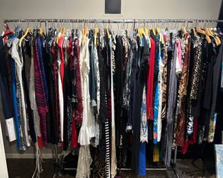 So many dresses, one full rack of new with tags coming soon