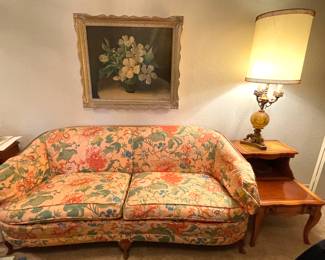 antique sofa- reupholstered with beautiful floral fabric - wood trim and wood legs