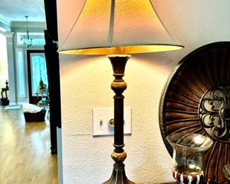 Several candlestick style lamps