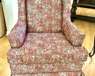 Tweed look swivel rocker