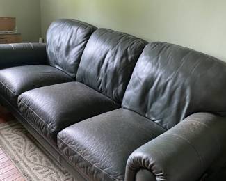 Beautiful leather sofa with matching chair and ottoman