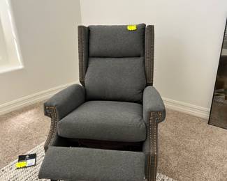 Like new!!  Beautiful contemporary recliner.