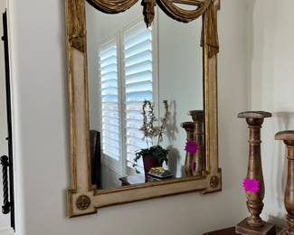 Love this ornate mirror that would be great in an entryway or as a special piece in a bedroom.