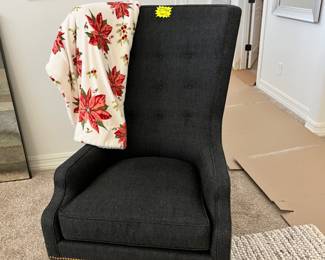 We love this high back accent chair in this luxurious fabric.