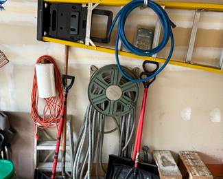 Hose reel, shovels, extension ladder, fiberglass ladder