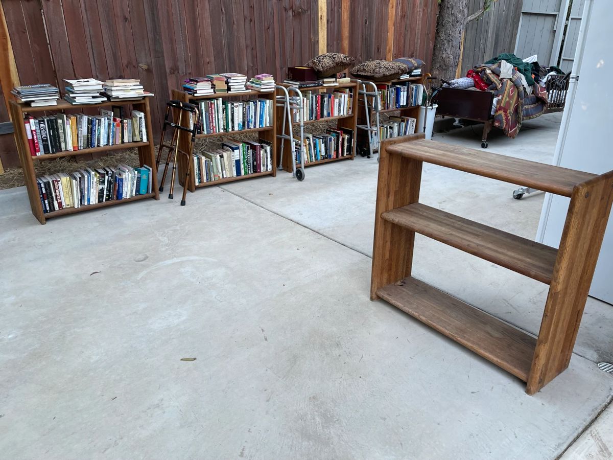 Three solid oak bookcases remaining (no books)